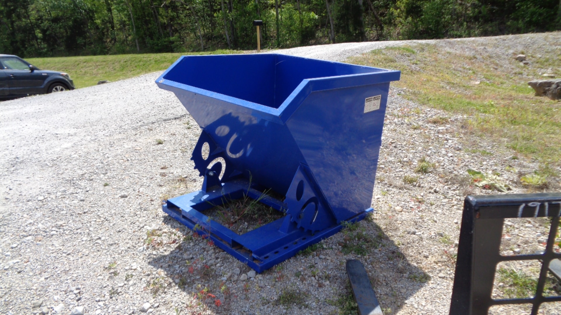 Self-dumping hopper front view